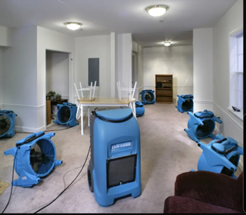 Air movers and dehumidifier setup for Water Damage Restoration in Yankee Springs